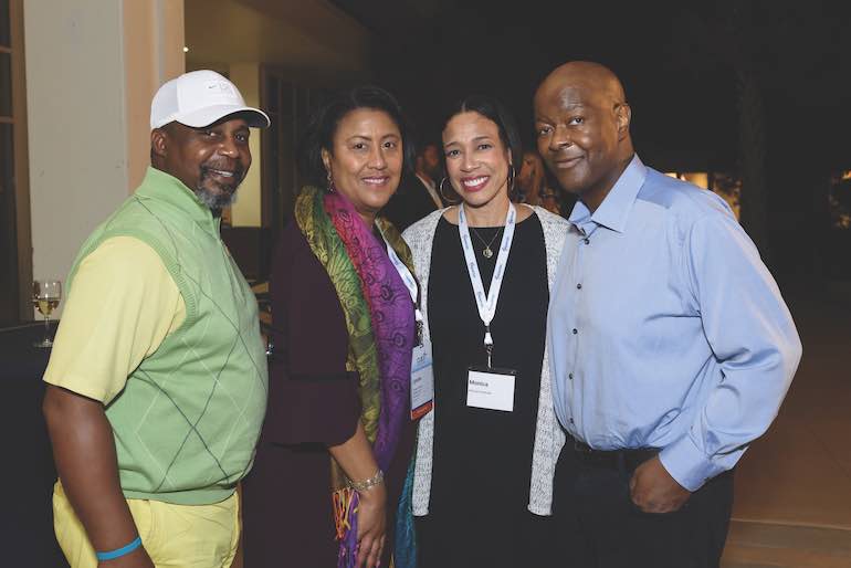 John and Monica Pembroke pose with Lynette Smith and guest