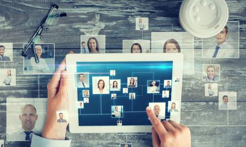 business woman networking digitally using table