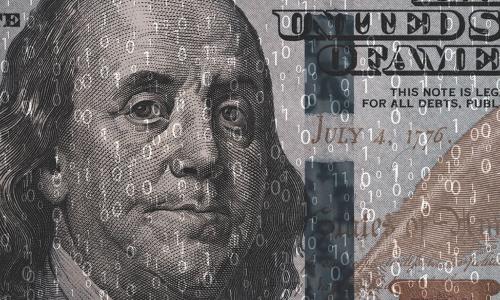 closeup of Benjamin Franklin on 100 dollar bill covered in digital 1s and 0s