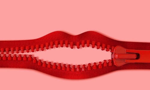 unzipping red zipper in shape of lips