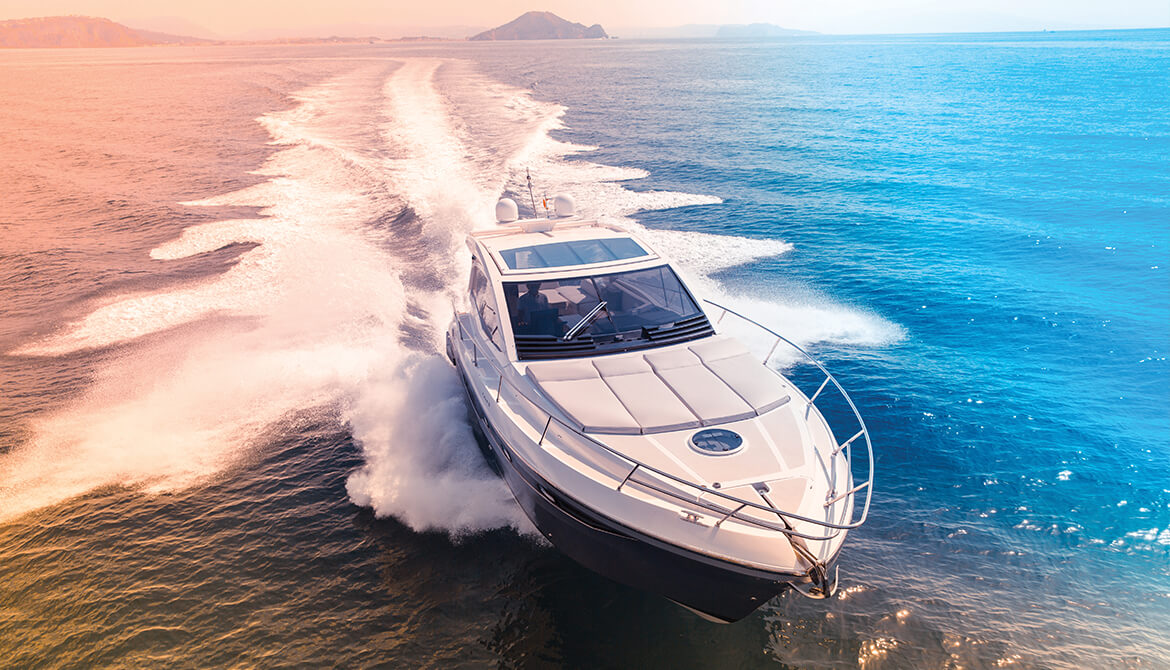 speed boat cruising through blue water at high speed