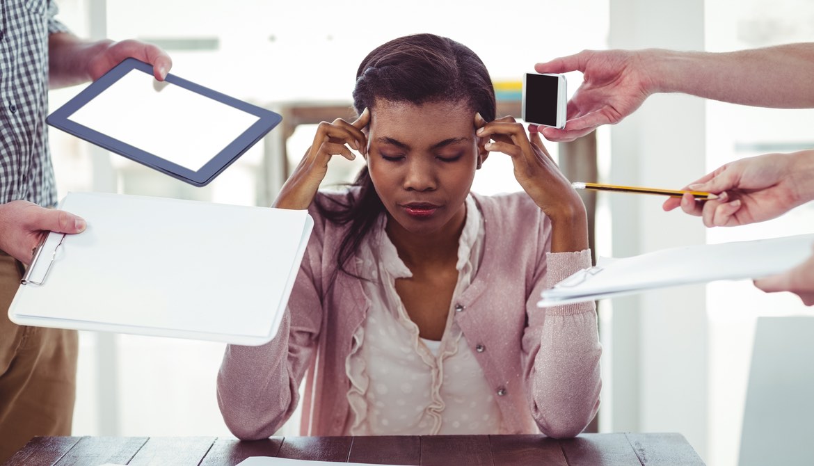 stressed businesswoman not being product due to too many interruptions