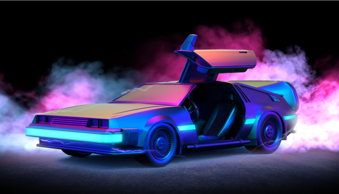 stage-lit delorean with steam around it