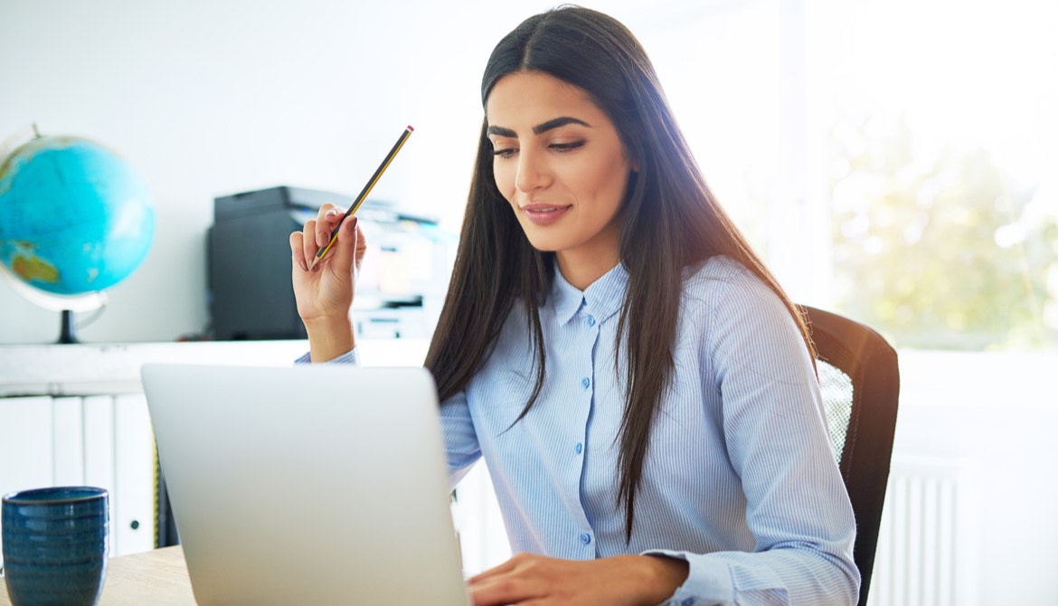 indian woman working on laptop