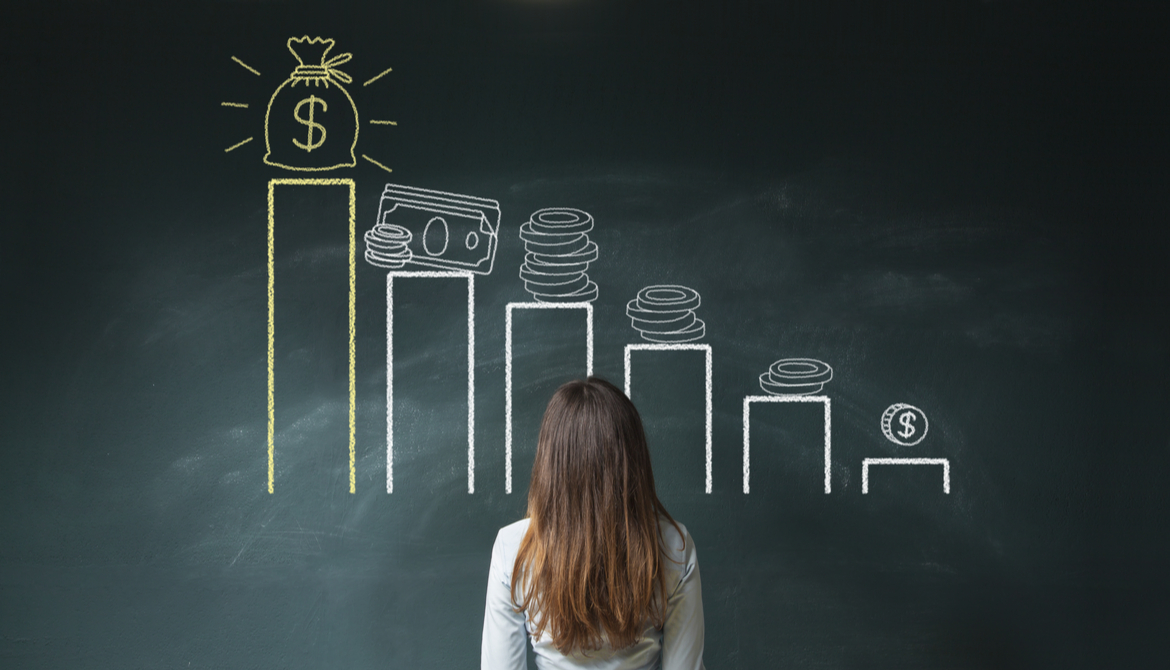 woman looking at chart with money