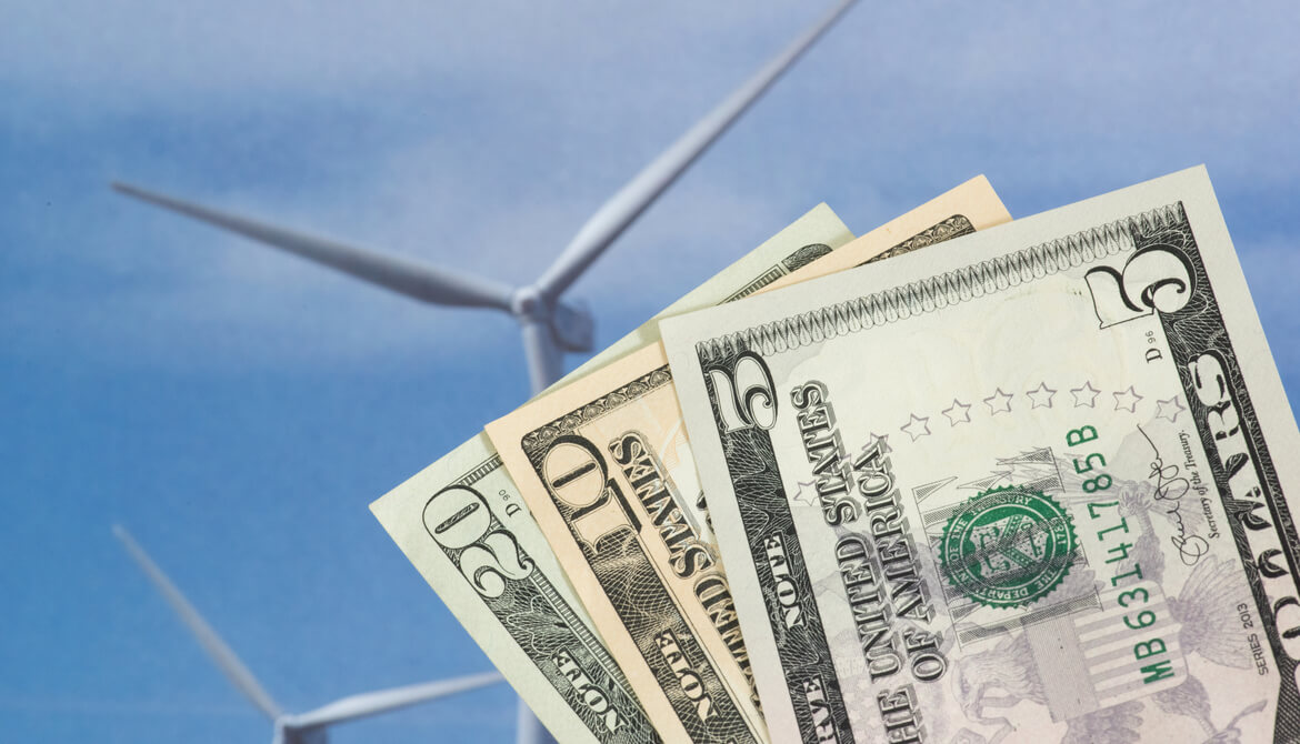 dollars with a wind turbine