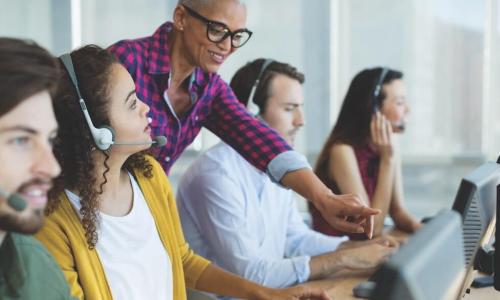 Call center manager working with staff