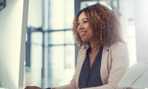 african american woman using the computer for online learning