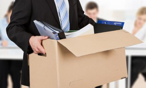 executive caring box full of his possessions 