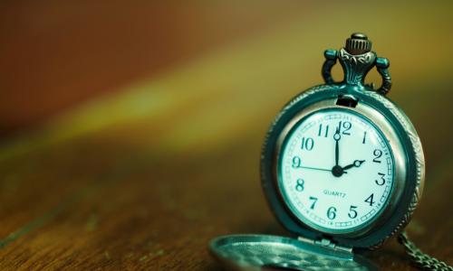 antique clock on boards