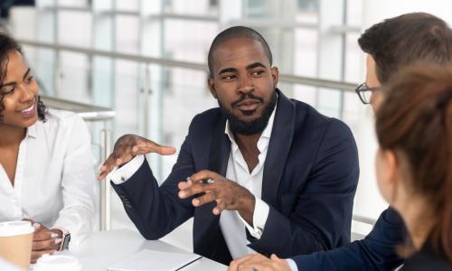 leader communicating in a meeting