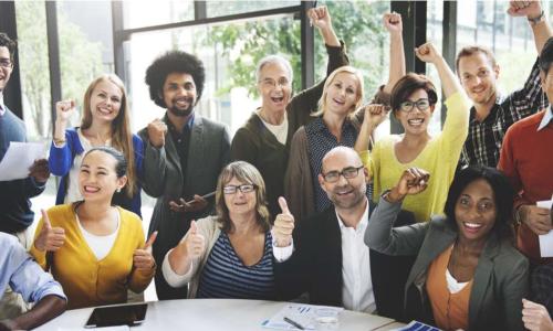 diverse team raising arms