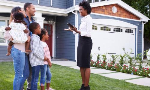 Black real estate agent shows home to a Black family